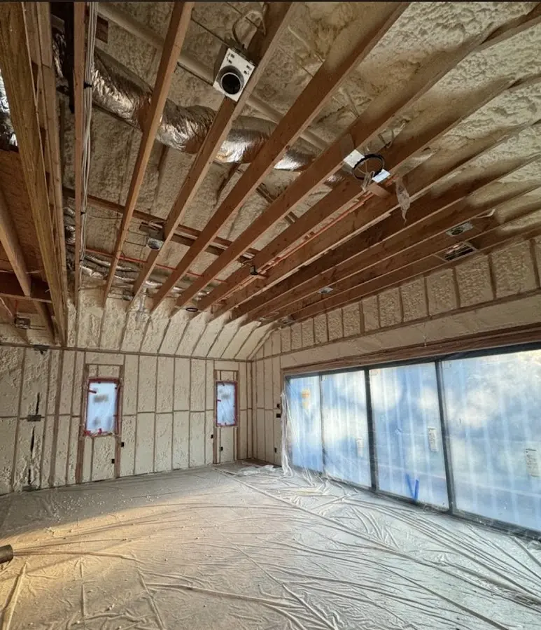 Interior walls and ceiling insulated with spray foam during new construction in Bethesda